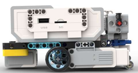 KI generiert: Das Bild zeigt einen LEGO-Mindstorms-Roboter mit verschiedenen Komponenten, darunter ein intelligentes Steuermodul, Motoren und Sensoren.